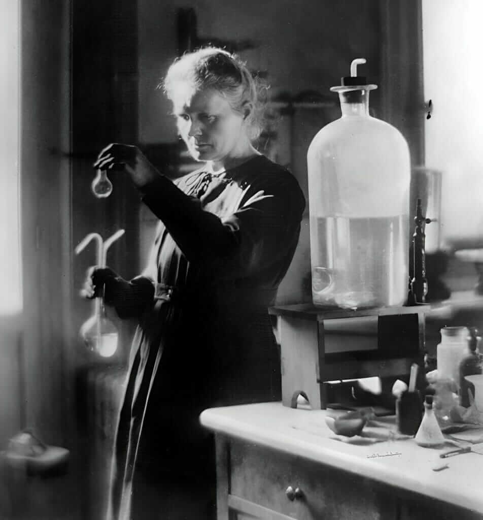 Marie Curie working in lab